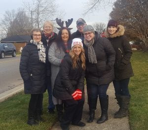 Some  of  PEC's  staff  volunteered  their  time  working  at  the  water  station  for  the  Reindeer  Run.